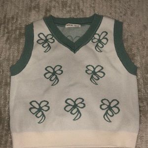 Green and white sweater vest